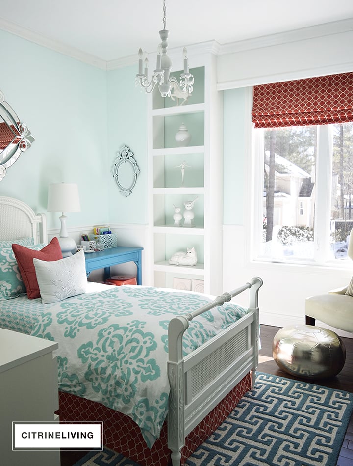 Girl's bedroom with pattern on pattern, Refreshing Teal wall color by Benjamin Moore 