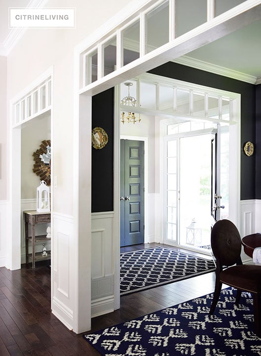 open-concept-black-walls-dining-room