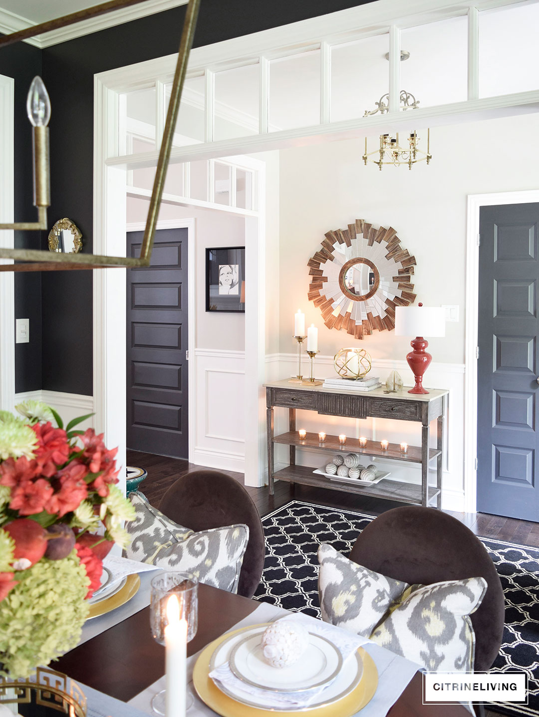 Fall decorated entryway with neutral and metallic decor and a punch of color for visual interest