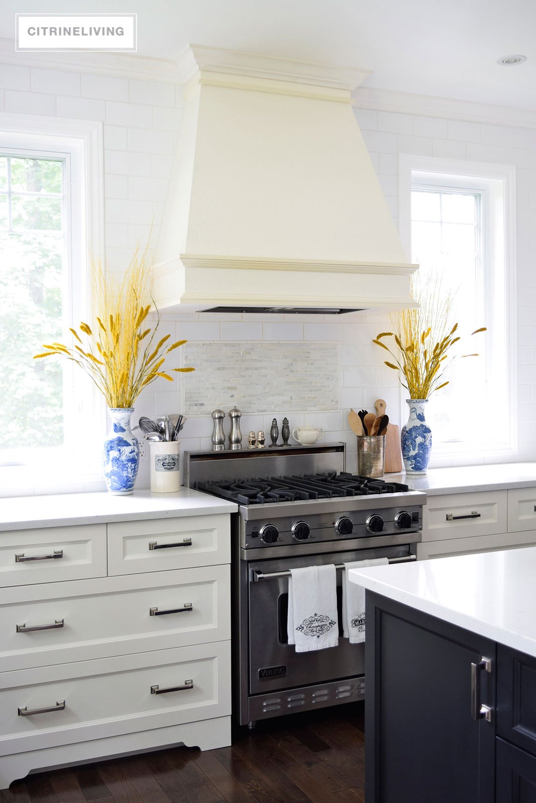 Fall decorated kitchen with blue and white ginger jars, rich gold accents and figs as a decorative element