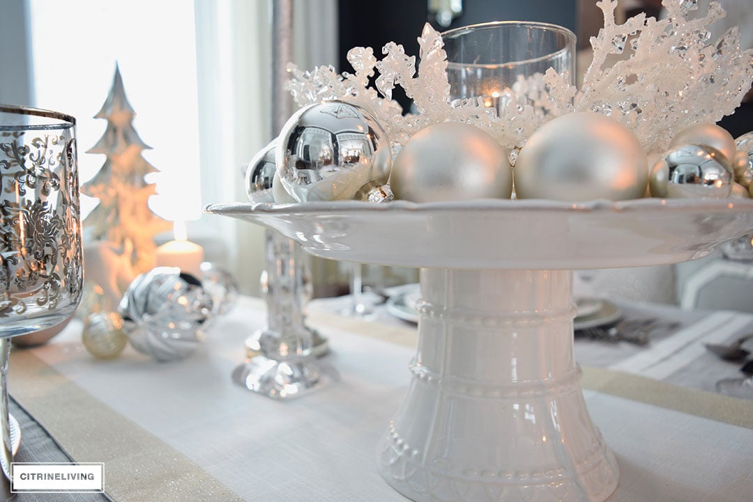 A WINTER WHITE AND SILVER HOLIDAY TABLESCAPE