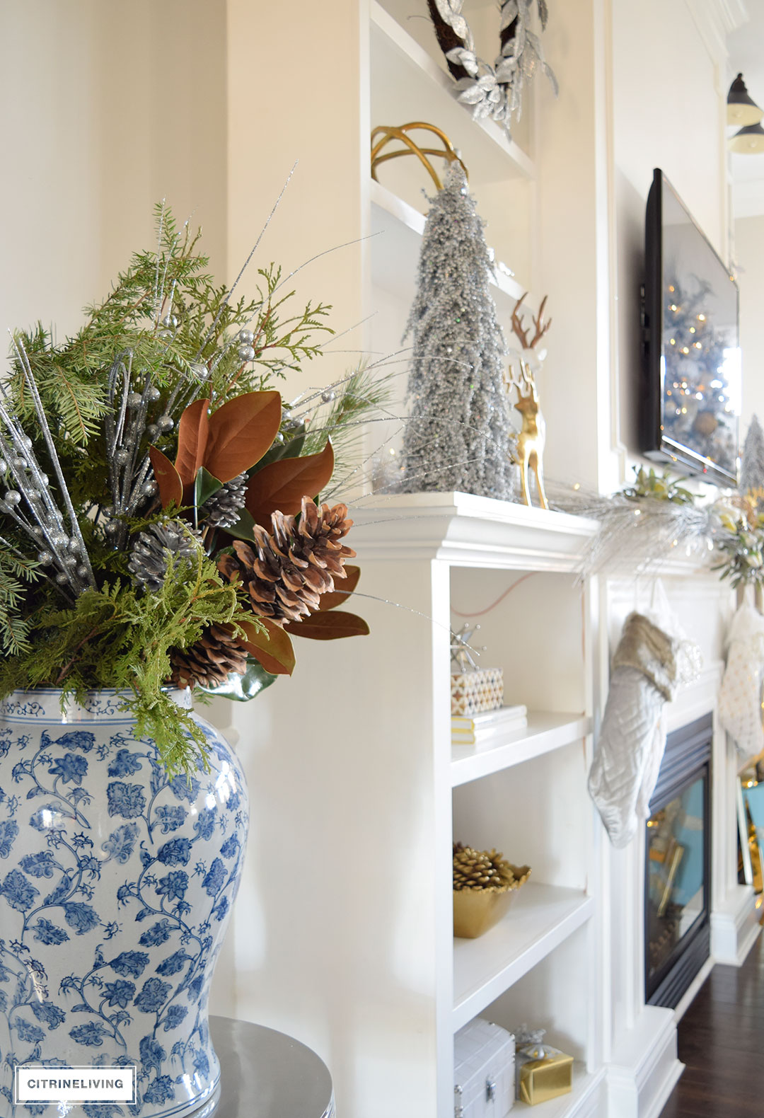 Christmas Home Tour - gorgeous metallics and blue and white e create a chic Holiday theme