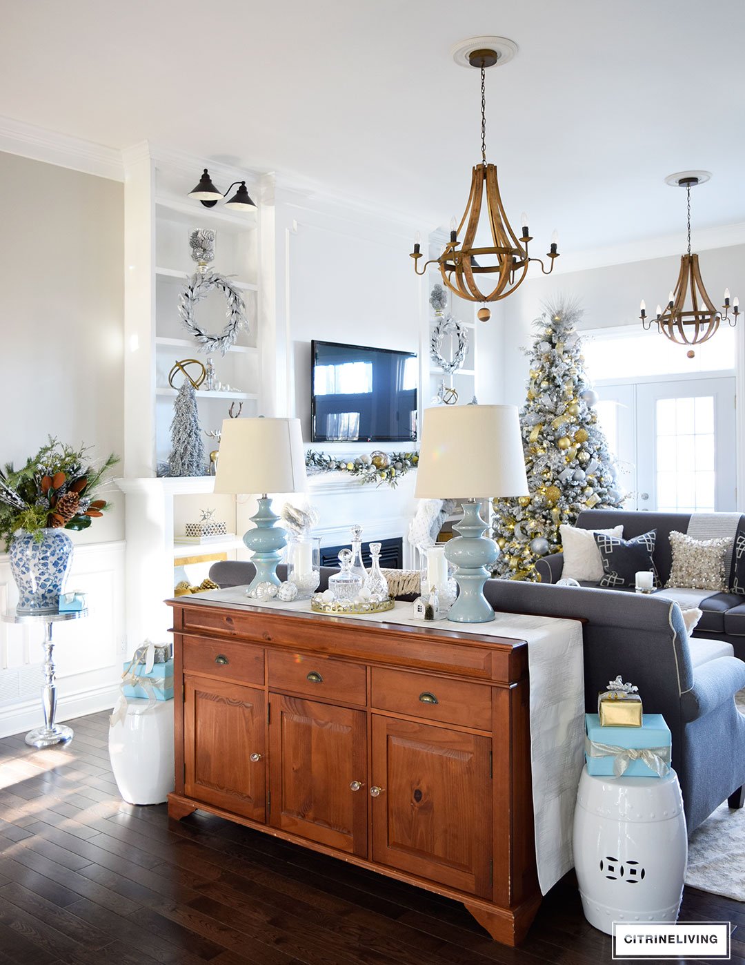 Christmas Home Tour - Gorgeous living room with metallics and icy blue for a perfectly chic Holiday theme