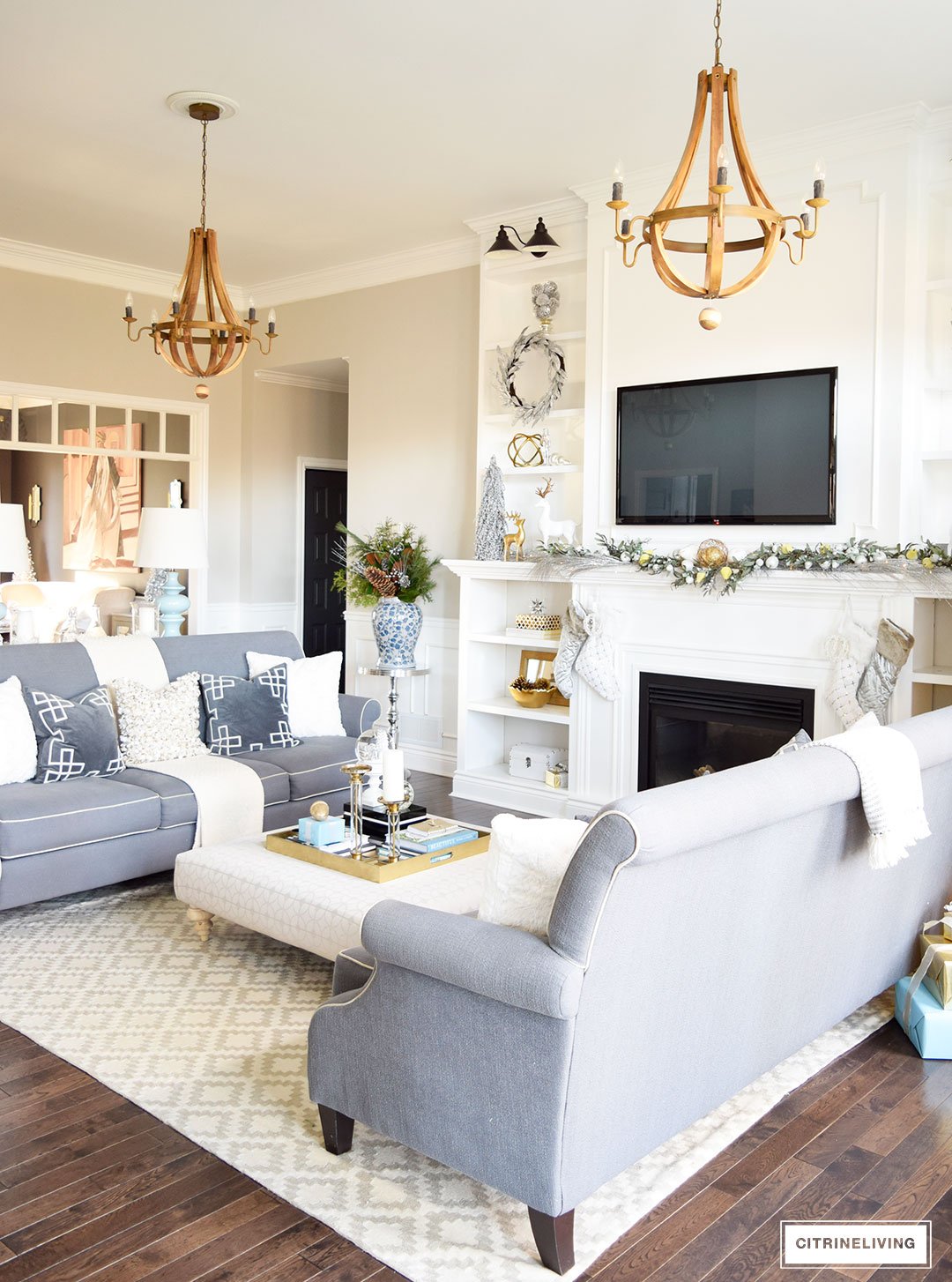 Christmas Home Tour -Gorgeous living room with mixed metallics and icy blue create a chic Holiday theme