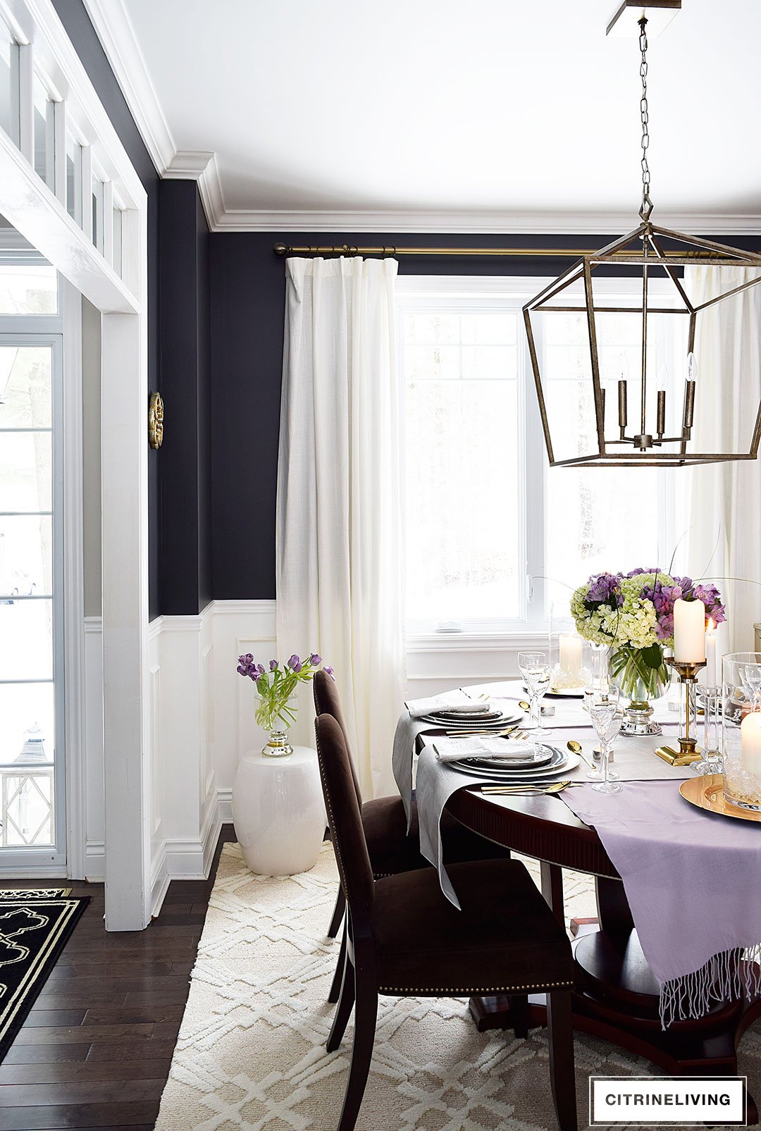 Lavender hues mixed with black and white, along with touches of metallics are a fresh take on a Valentine's Day tablescape for four.