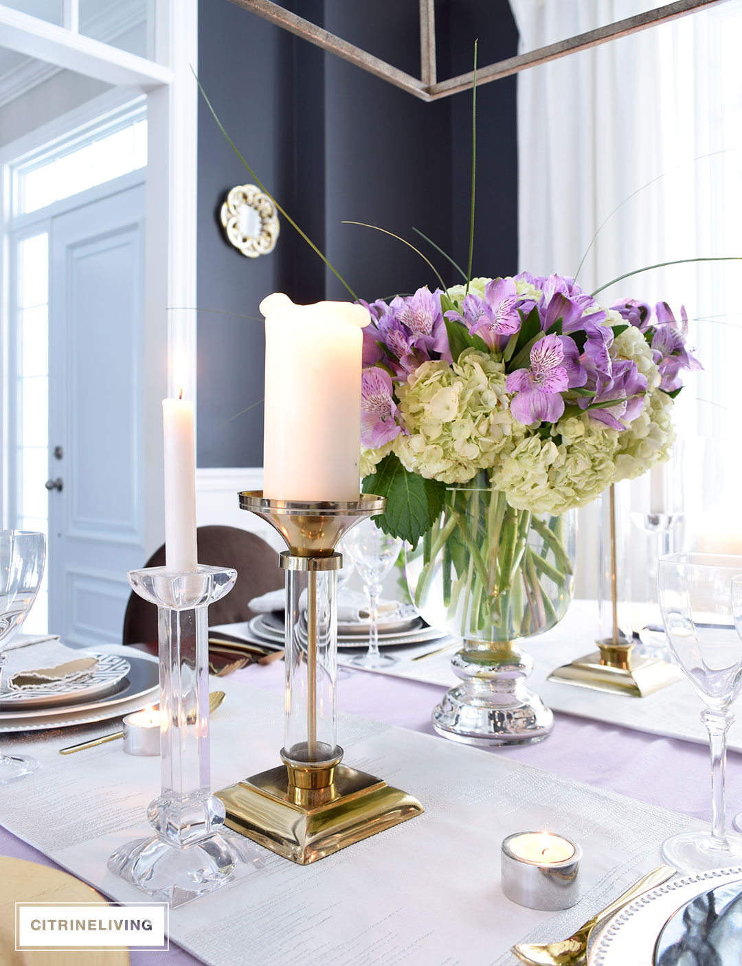 Lavender hues mixed with black and white, along with touches of metallics are a fresh take on a Valentine's Day tablescape for four.