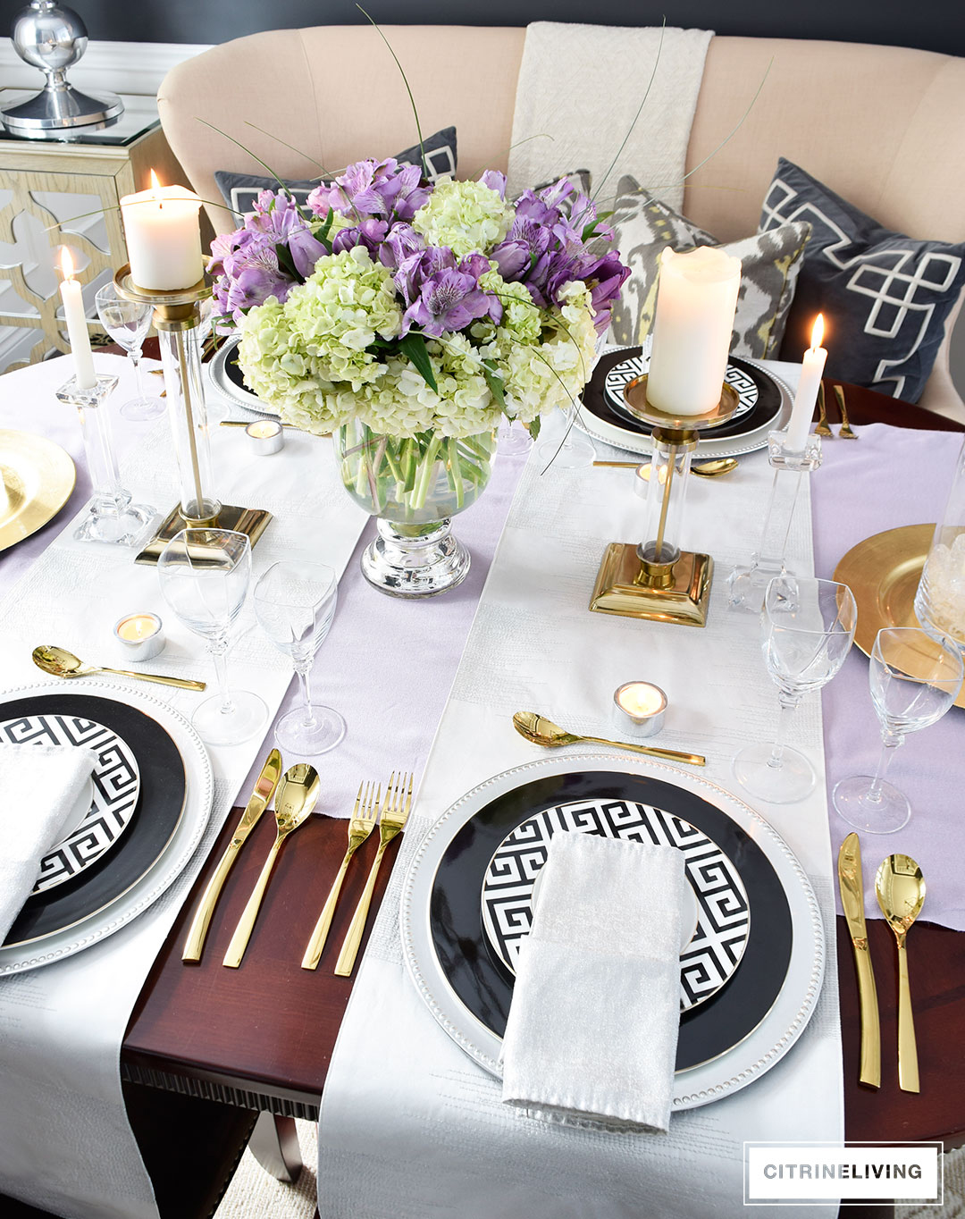Lavender hues mixed with black and white, along with touches of metallics are a fresh take on a Valentine's Day tablescape for four.