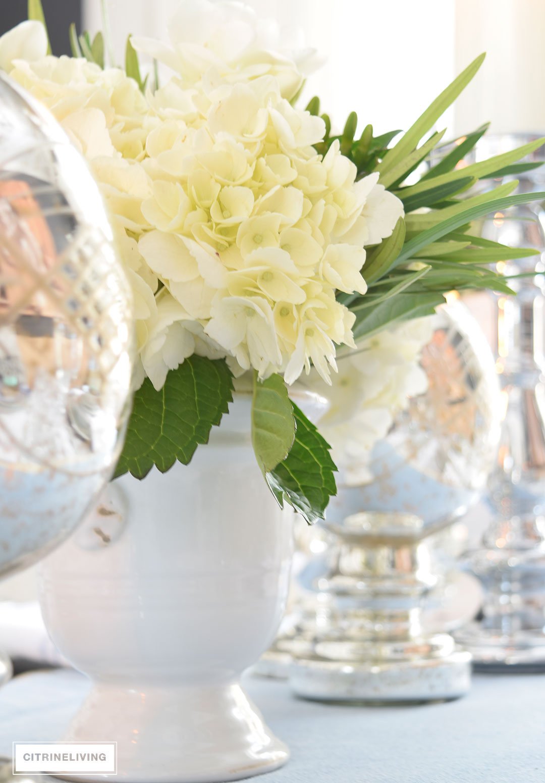 Simple and classic fresh hydrangeas are always the perfect centerpiece for any table. 