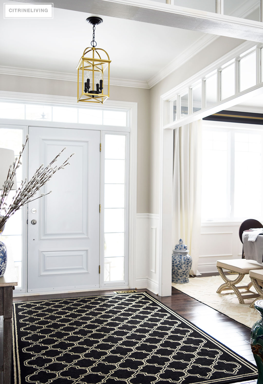 A two-toned brass and black lantern is the perfect addition to an entryway or hallway.