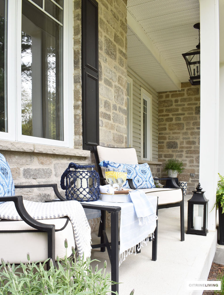 SPRING PORCH DECORATED WITH BLUE AND WHITE ACCENTS