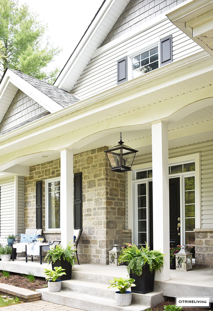 SPRING PORCH DECORATED WITH BLUE AND WHITE ACCENTS