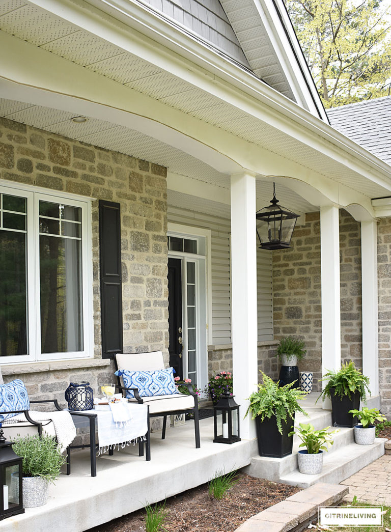 SPRING PORCH DECORATED WITH BLUE AND WHITE ACCENTS