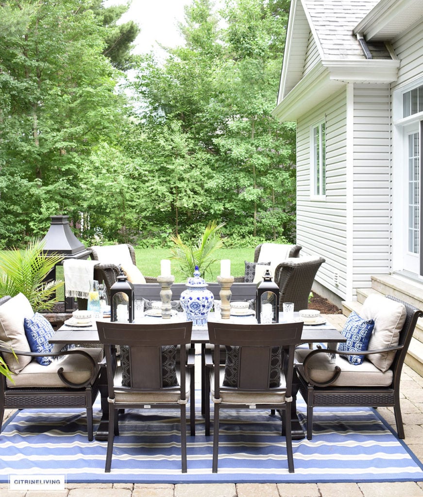 Backyard patio decor and dining area and conversation area.