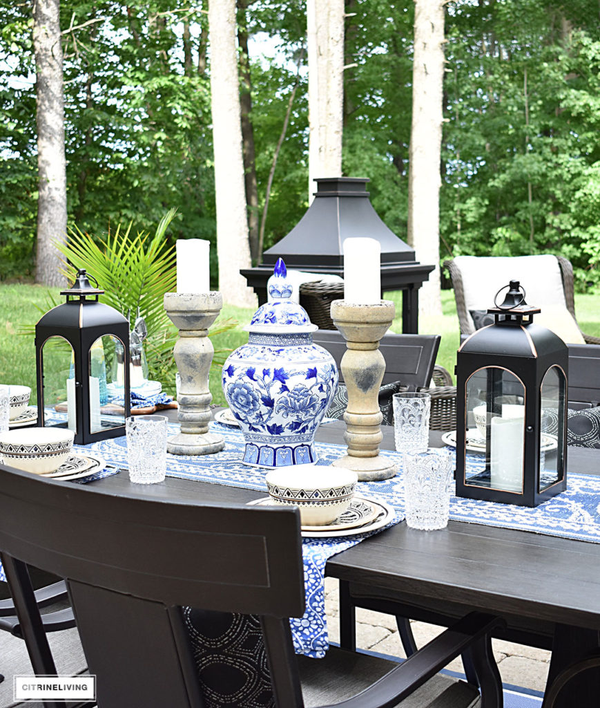 Blue and white accessories and linens paired with Moroccan inspired outdoor dishware are the ideal compliment for al fresco entertaining! Keep the look classic with ginger jars, lanterns and candles arranged symmetrically. 