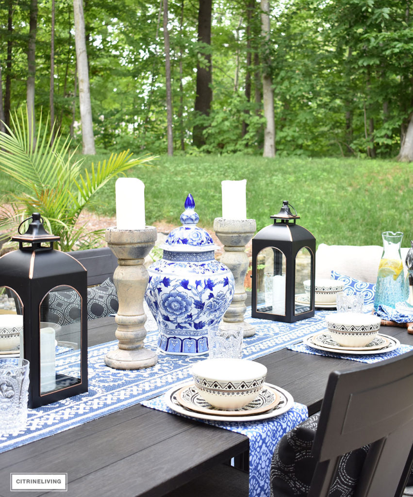Blue and white accessories and linens paired with Moroccan inspired outdoor dishware are the ideal compliment for al fresco entertaining! Keep the look classic with ginger jars, lanterns and candles arranged symmetrically. 