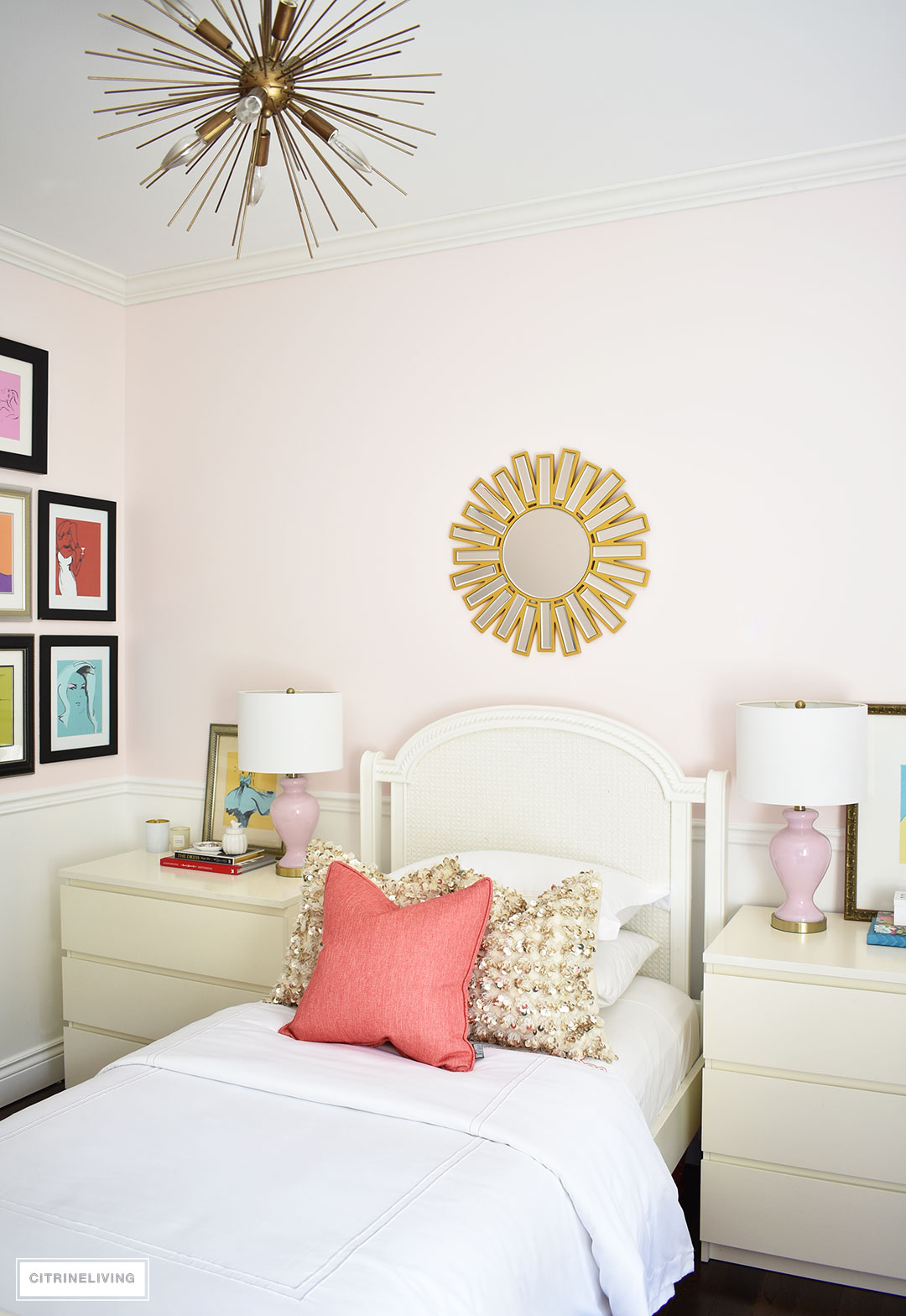 A chic, modern girl's bedroom featuring blush pink walls, coral and brass accessories and brass lighting, is a fun and sophisticated look!