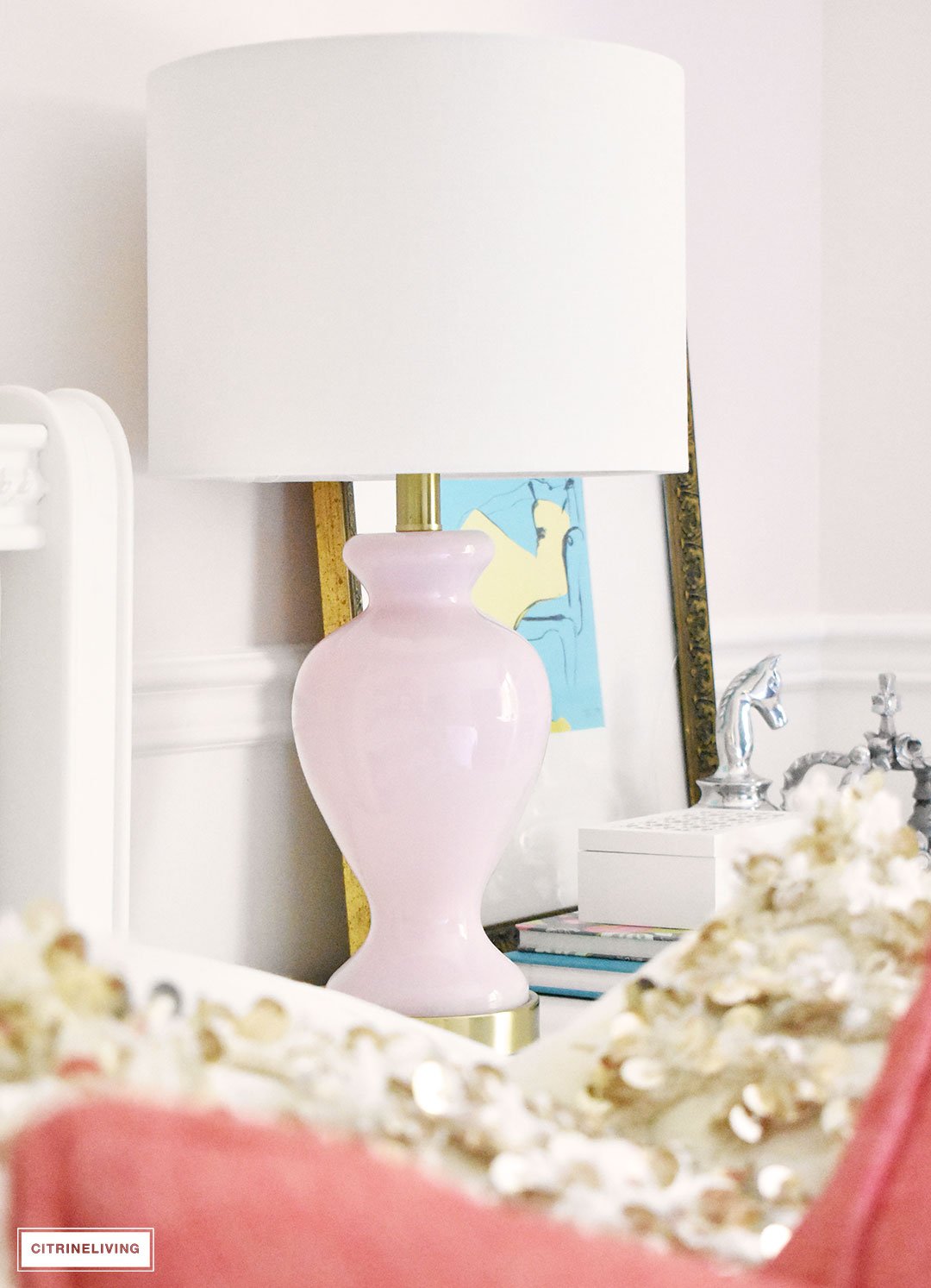 BLUSH PINK AND CORAL BEDROOM WITH BRASS ACCENTS