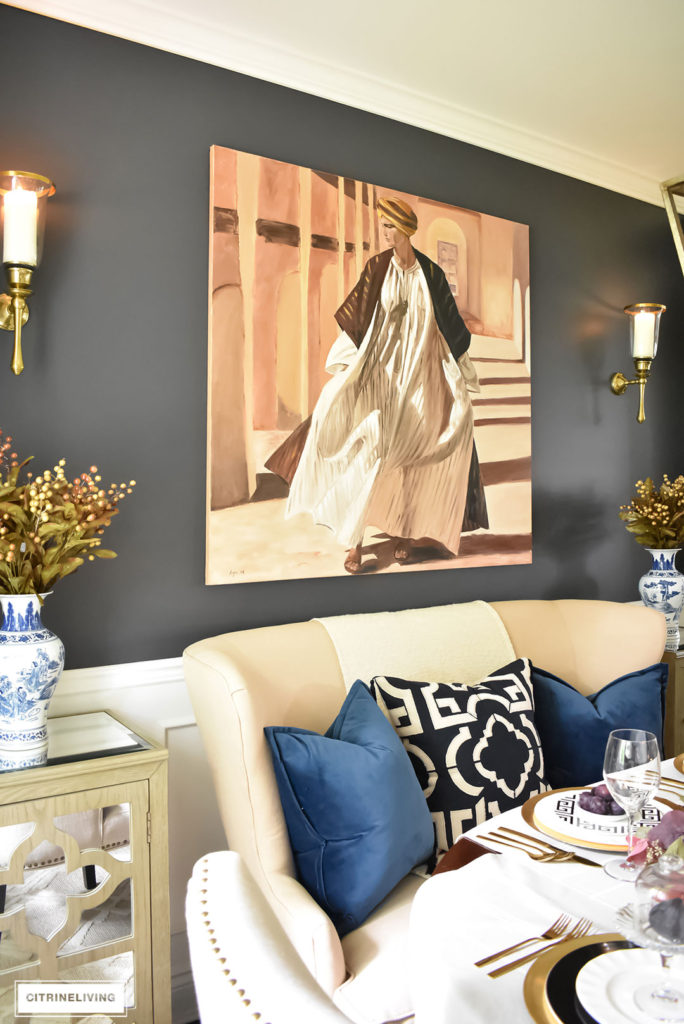 Fall Home Tour. Dining room with original art, settee and wall sconces. 