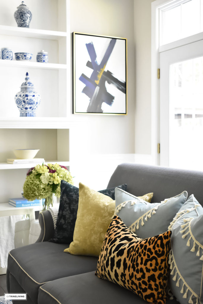 Fall Home Tour with navy and gold velvet pillows and accents. Blue and white ginger jars and leopard pillow.