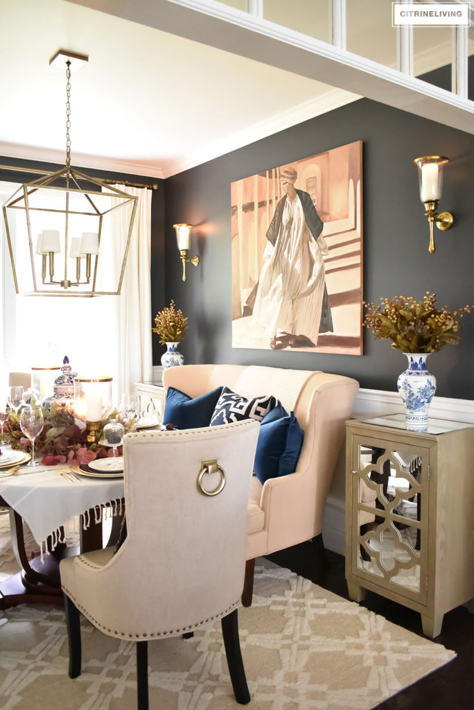 Fall Home Tour. Black dining room with brass lighting and wall sconces. Blue and white chinoiserie.