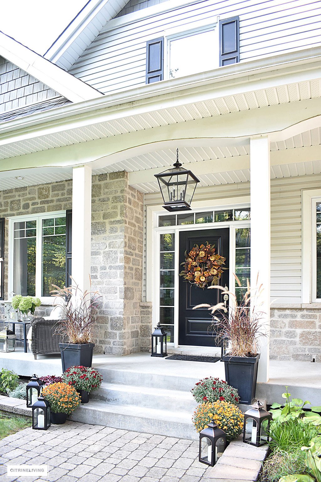 AN ELEGANT FRONT PORCH DECORATED FOR FALL