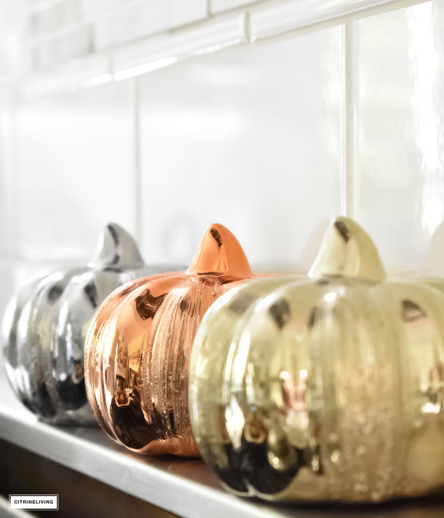 Fall Home Tour - kitchen with mercury glass pumpkins.