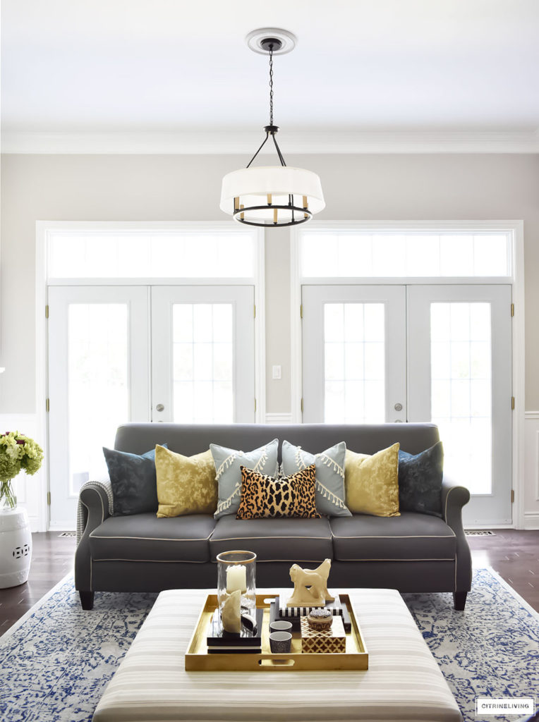 Fall Home Tour with navy and gold velvet pillows and accents. Leopard pillow. Drum shade chandelier.