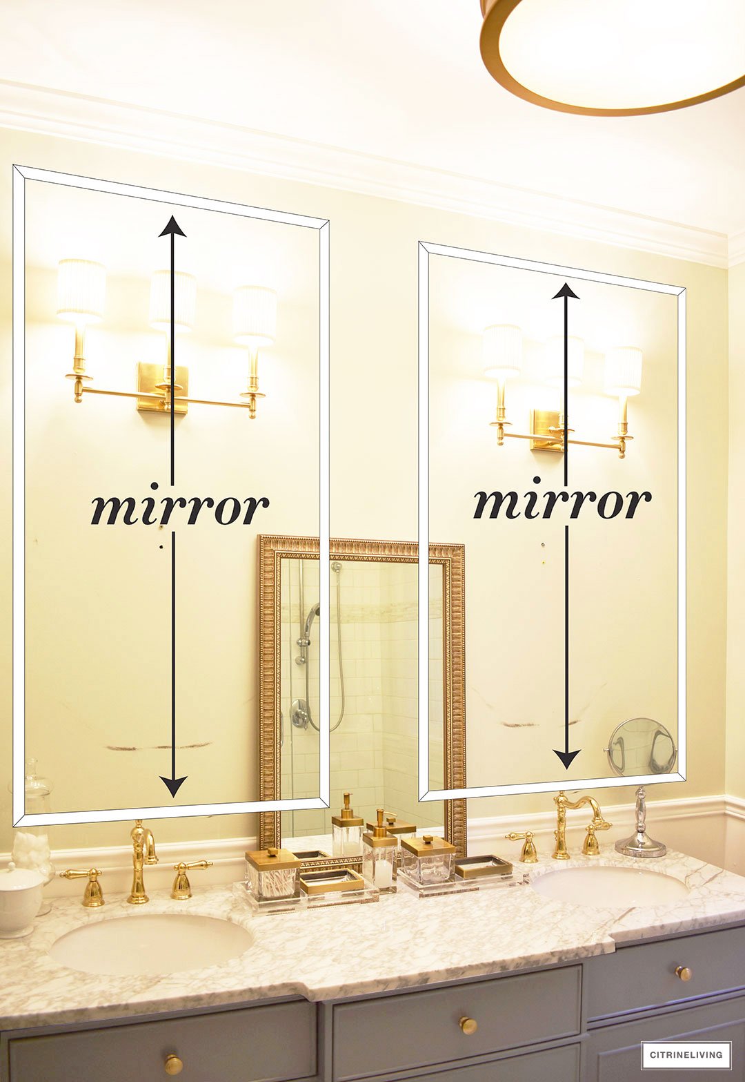 Gorgeous master bathroom makeover with wall panelling, brass lighting and a stunning gray vanity with marble counters.