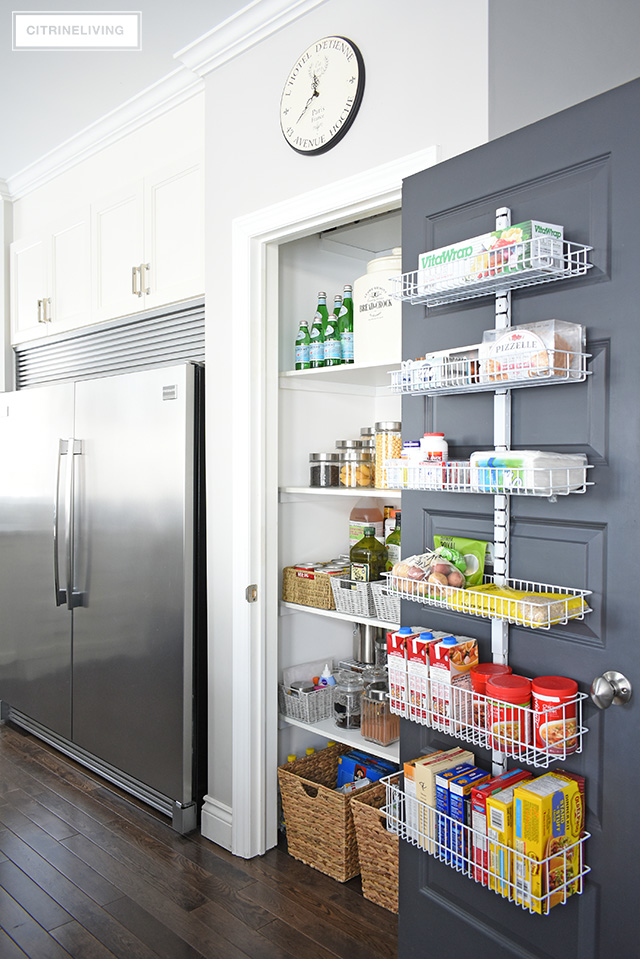 An organized kitchen pantry that went from chaotic, cluttered, messy and overwhelming to streamlined, paired-down and perfectly organized - all under $300!
