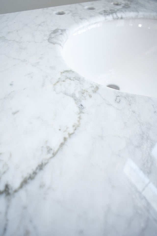 A classic white bathroom vanity with a marble top is the perfect addition to a small bath. Update and bathroom with this versatile piece for a clean and crisp look in your bathroom!