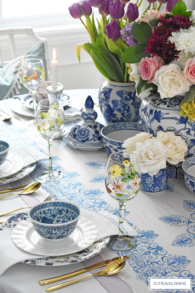 AN EASTER TABLESCAPE WITH BLUE AND WHITE AND LAVENDER