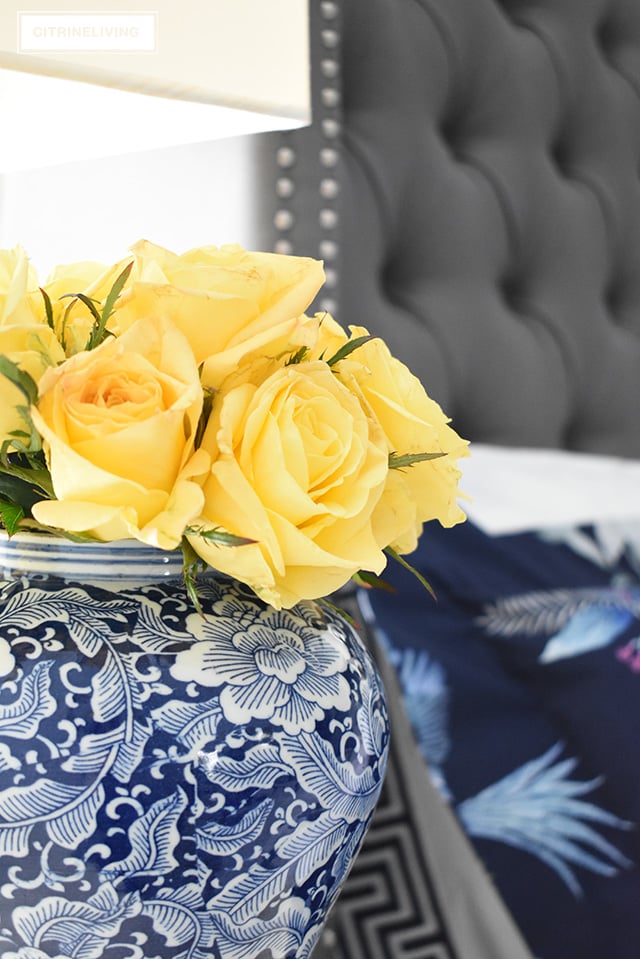 Classic white + navy hotel chic bedding is so gorgeous paired with this navy chinoiserie duvet and shams for a rich and elegant look in our bedroom.