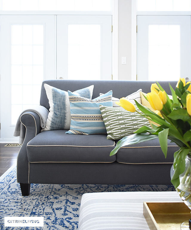 Elegant Spring decorating using pretty blue and vibrant yellow accents along with real and faux florals to help bring a sophisticated yet relaxed feel to your home.