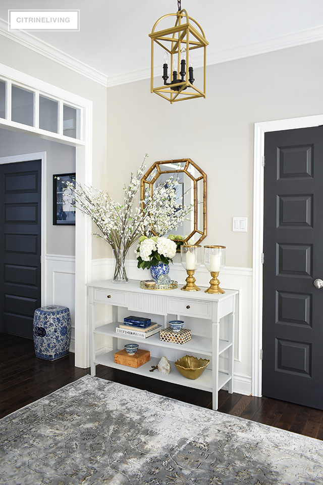 Elegant Spring decorating using pretty blue and vibrant yellow accents along with real and faux florals to help bring a sophisticated yet relaxed feel to your home.