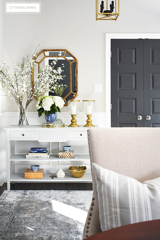 Elegant Spring decorating using pretty blue and vibrant yellow accents along with real and faux florals to help bring a sophisticated yet relaxed feel to your home.