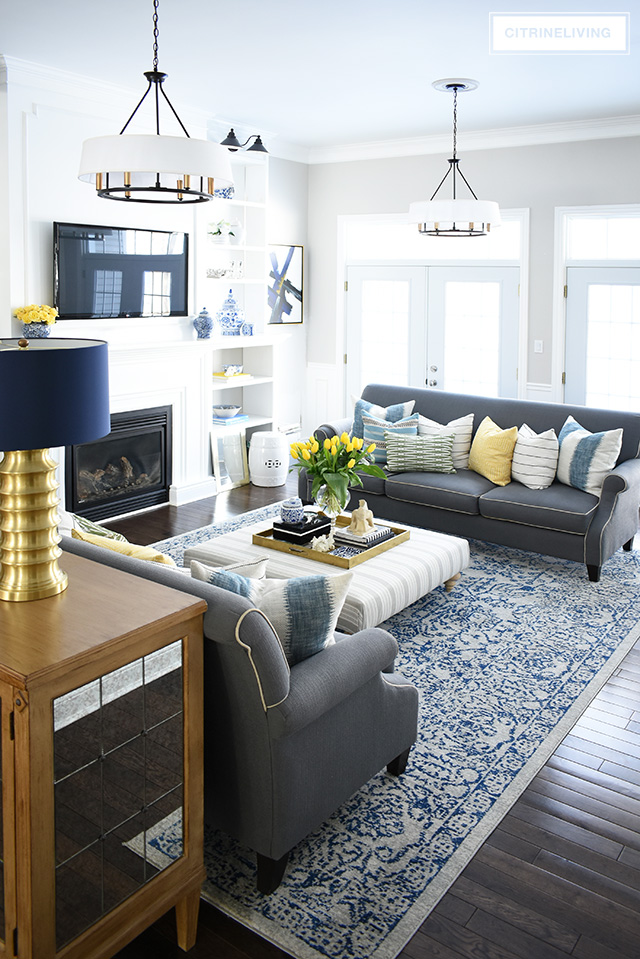 Elegant Spring decorating using pretty blue and vibrant yellow accents along with real and faux florals to help bring a sophisticated yet relaxed feel to your home.