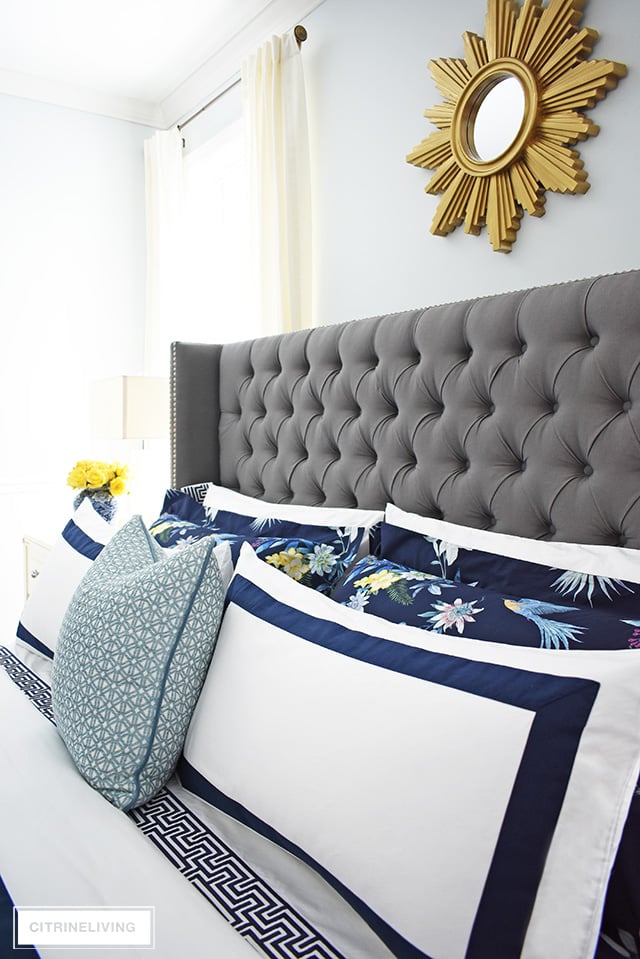 Classic white + navy hotel chic bedding is so gorgeous paired with this navy chinoiserie duvet and shams for a rich and elegant look in our bedroom.