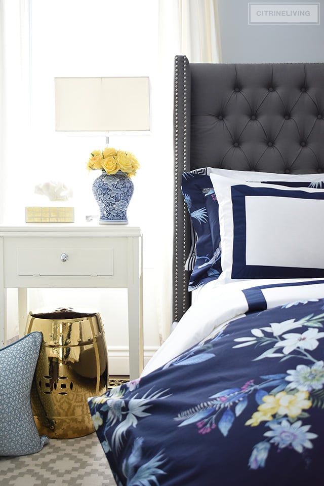 Classic white + navy hotel chic bedding is so gorgeous paired with this navy chinoiserie duvet and shams for a rich and elegant look in our bedroom.