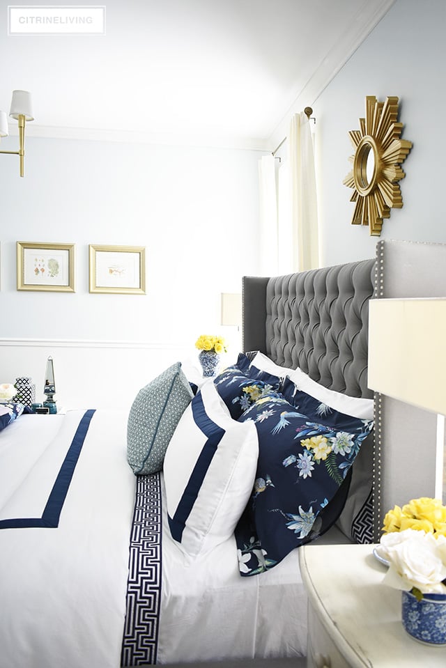 Classic white + navy hotel chic bedding is so gorgeous paired with this navy chinoiserie duvet and shams for a rich and elegant look in our bedroom.