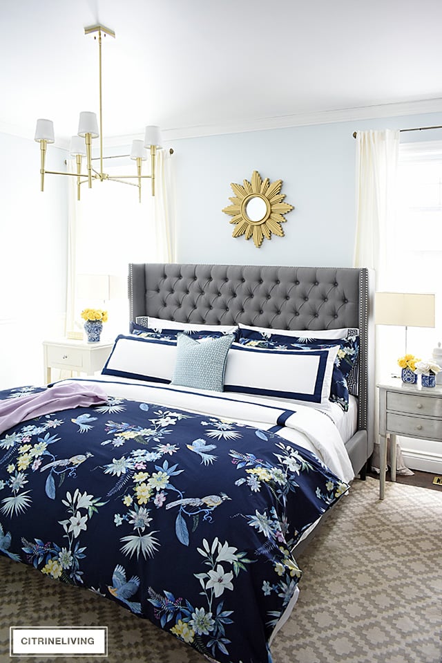 Classic white + navy hotel chic bedding is so gorgeous paired with this navy chinoiserie duvet and shams for a rich and elegant look in our bedroom.