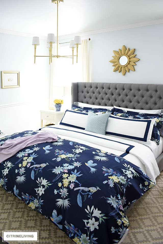 Classic white + navy hotel chic bedding is so gorgeous paired with this navy chinoiserie duvet and shams for a rich and elegant look in our bedroom.