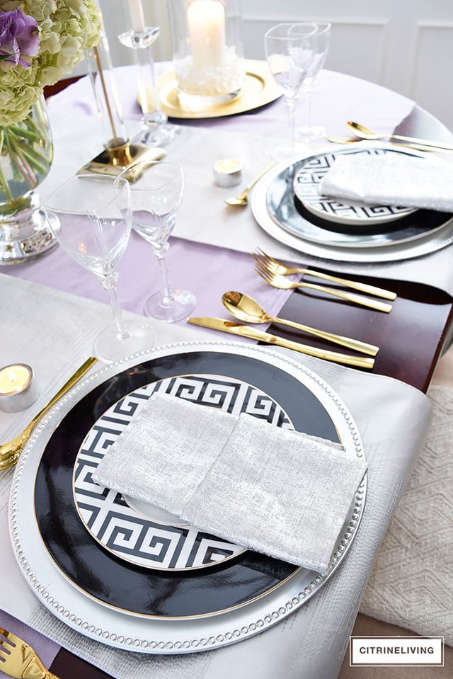 Black and white greek key plates paired with gold, silver and lavender is a stunning combination for any table! 