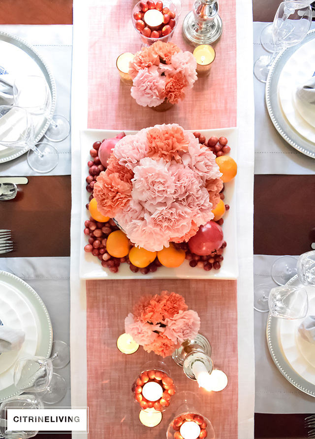 Pink and coral carnations mxake a gorgeous centrepiece for any time of year!