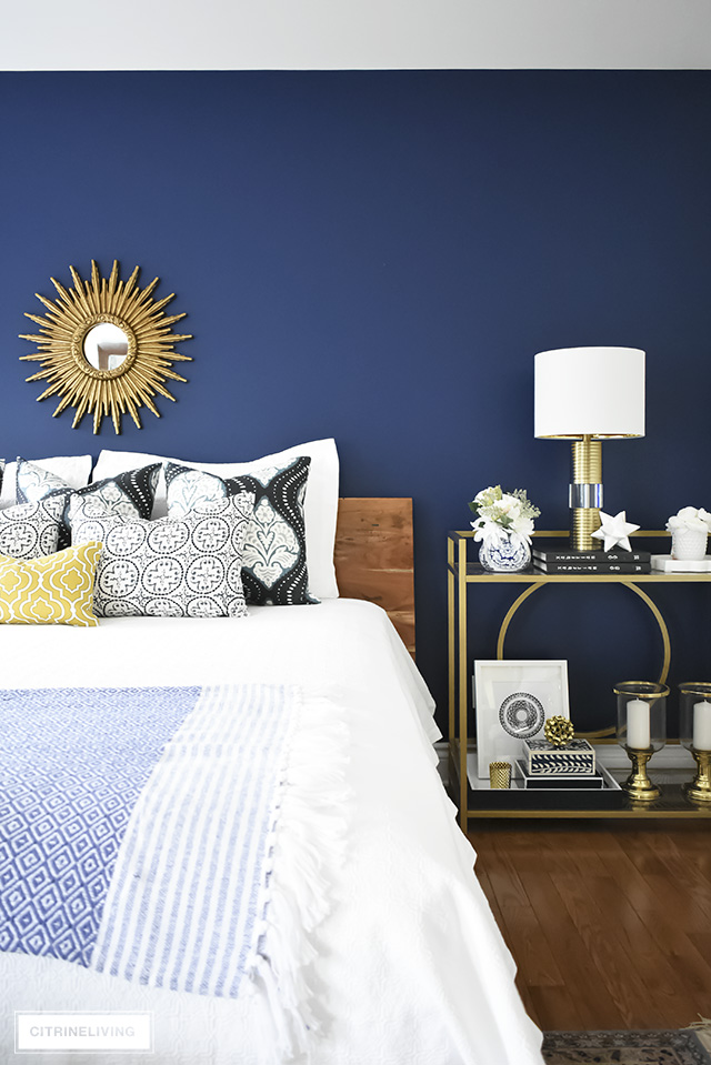 This gorgeous bedroom makeover went from dark and drab to bright and sophisticated with a boho-glam edge that will make you want to create this look yourself!