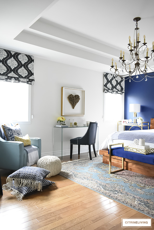 This gorgeous bedroom makeover went from dark and drab to bright and sophisticated with a boho-glam edge that will make you want to create this look yourself!