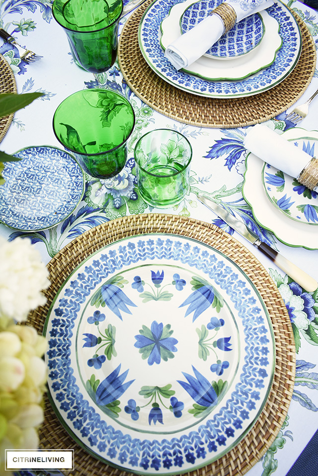 Gorgeous blue, white, and green elegant summer tablescape with a laid back look that's sophisticated and chic! See how to pull this look together for your summer entertaining.