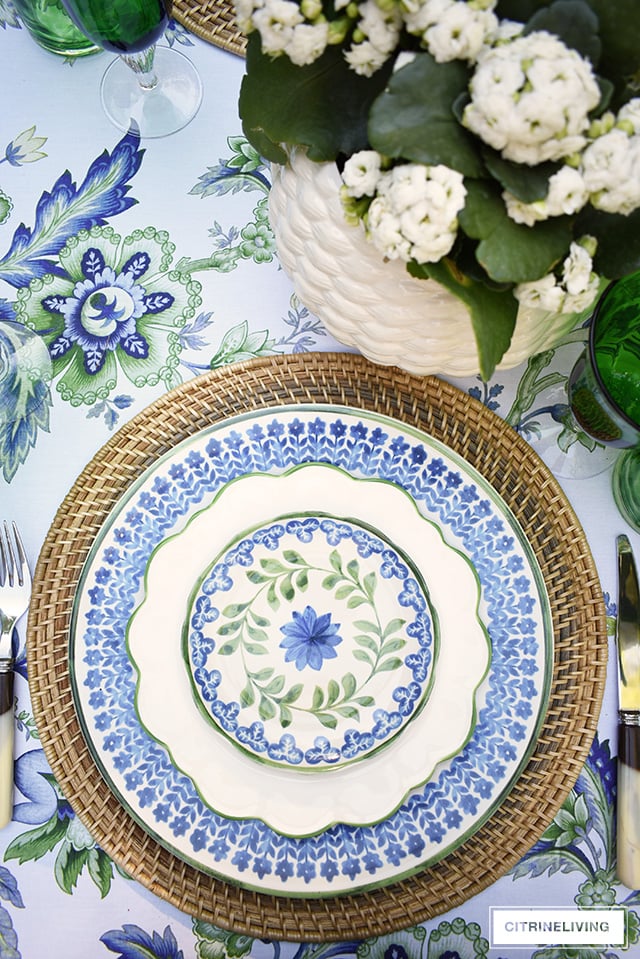 Gorgeous blue, white, and green elegant summer tablescape with a laid back look that's sophisticated and chic! See how to pull this look together for your summer entertaining.