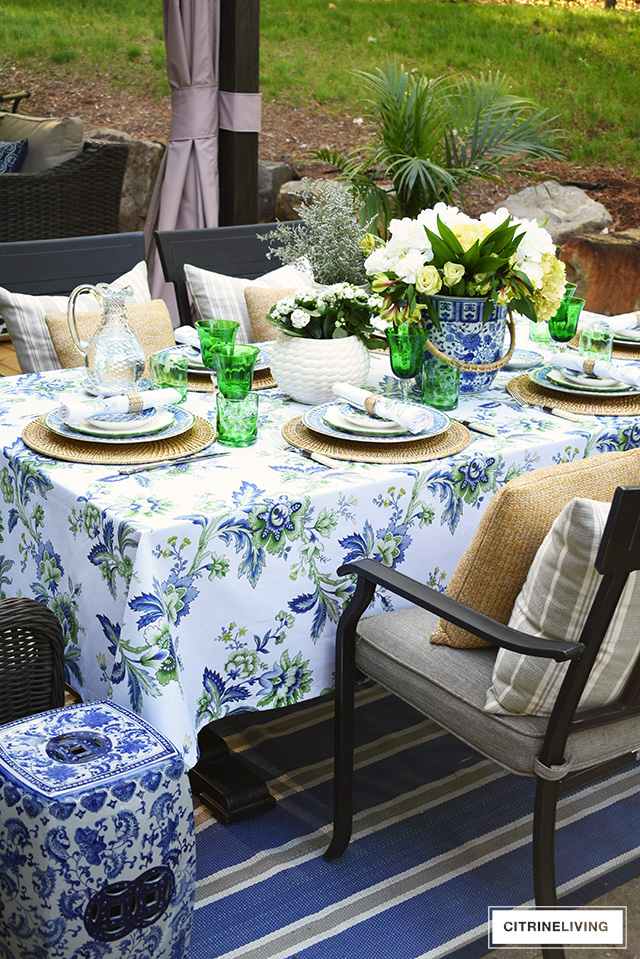 Gorgeous blue, white, and green elegant summer tablescape with a laid back look that's sophisticated and chic! See how to pull this look together for your summer entertaining.