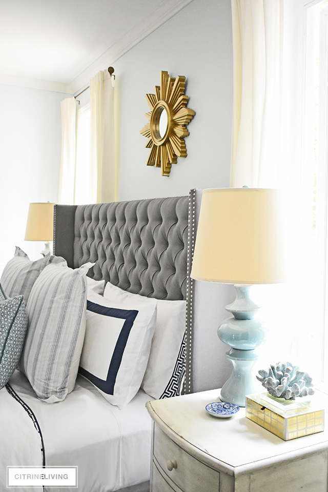Adding summer touches to your bedroom is as simple as throw pillows, a casual throw, and some pretty coastal accents. Bring in the season with these these no-fail tips for a relaxing and airy summer bedroom!
