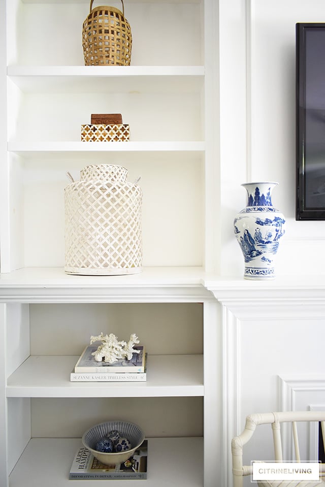 Create a casual and elegant summer living room with calming neutrals, layers of textures and hints on blue and white for a relaxing, laid-back look.